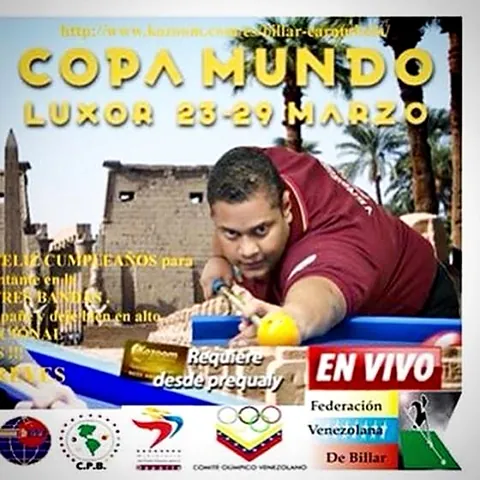 Afiche de Kozoom para la Copa del Mundo de Luxor, con los sellos de la FVB y del Comité Olímpico Venezolano.